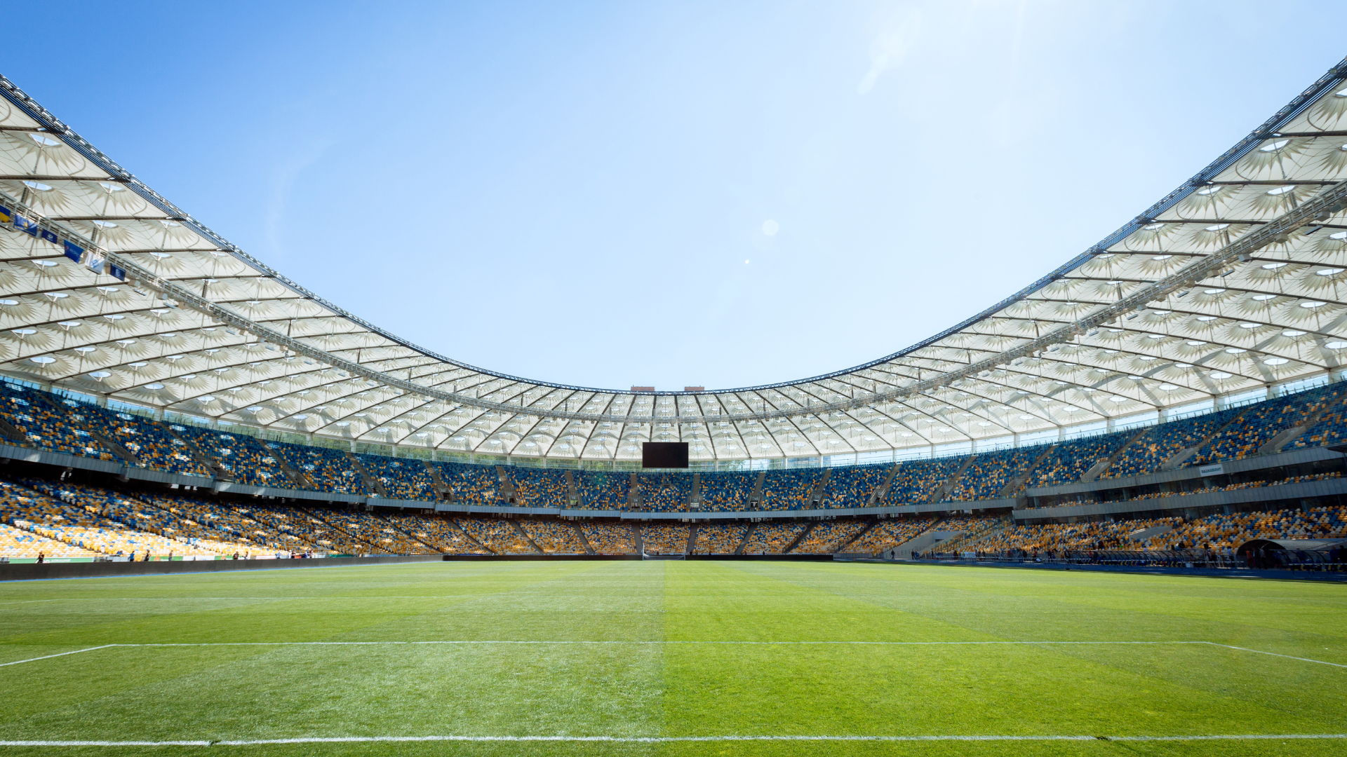 football stadium with blue sky