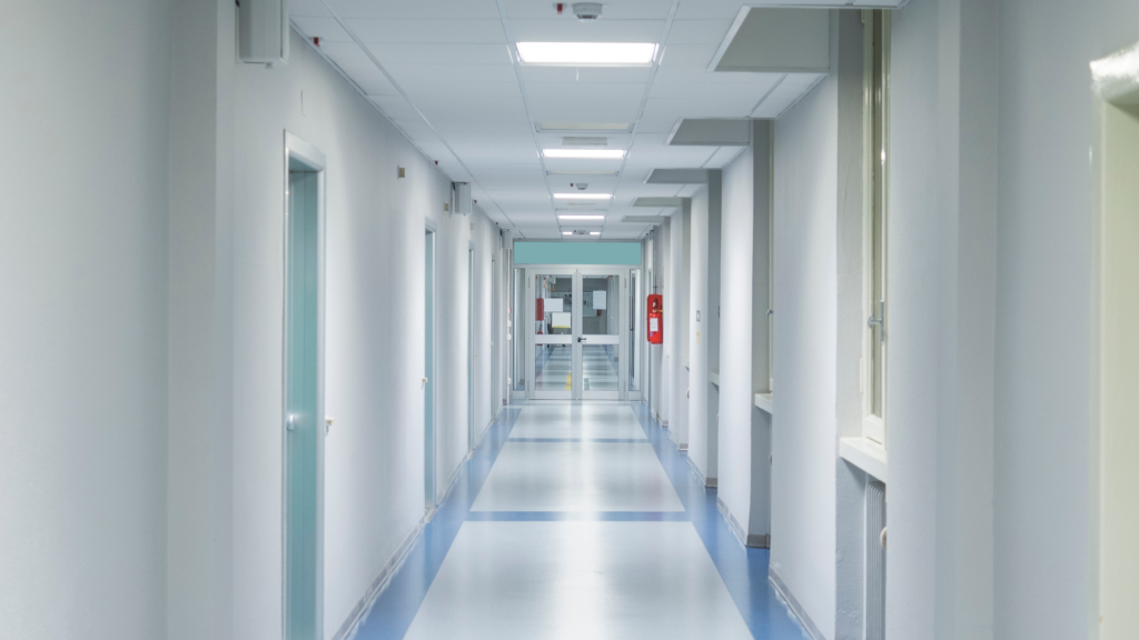 corridor in public building with white walls and LED lighting