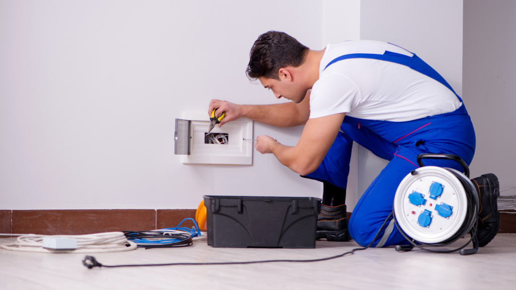 man conducting electrical inspection