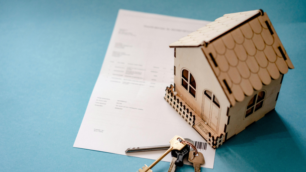 small model house with keys